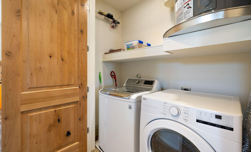Utility closet next to second bedroom and bath. Washer/Dryer are negotiable. Upgraded water heater above.