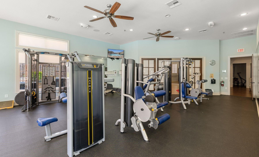 Community center has full gym with trainers available(overlooks lap swimming pool also).