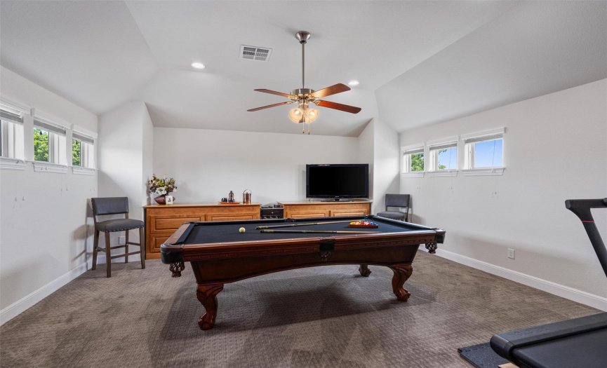 Spacious bonus room allows for a game of pool as well as workout time!