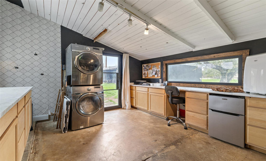 The home also offers a spacious laundry room that can also be a personal home office