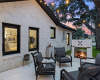 The property features two custom outdoor fireplaces