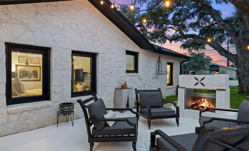 The property features two custom outdoor fireplaces