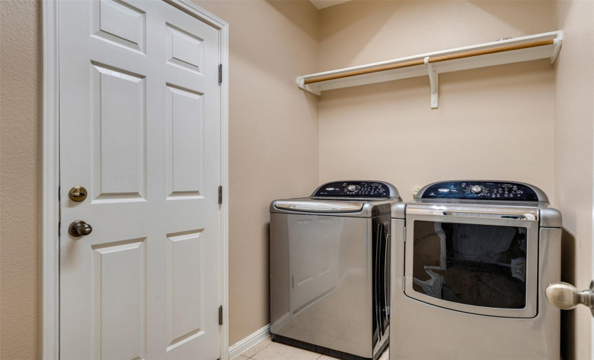 A well-appointed laundry room, adding to the home's practicality.