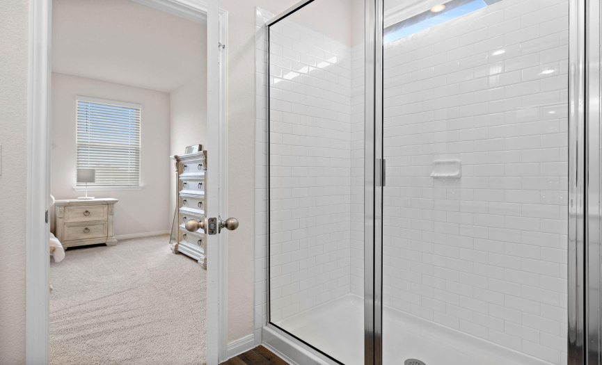 Extended walk-in shower in the primary bath