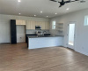 Photo is of another home in the same community with the same floorplan and simlar finishes. 