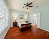 Primary bedroom ~ French doors & plantation shutters