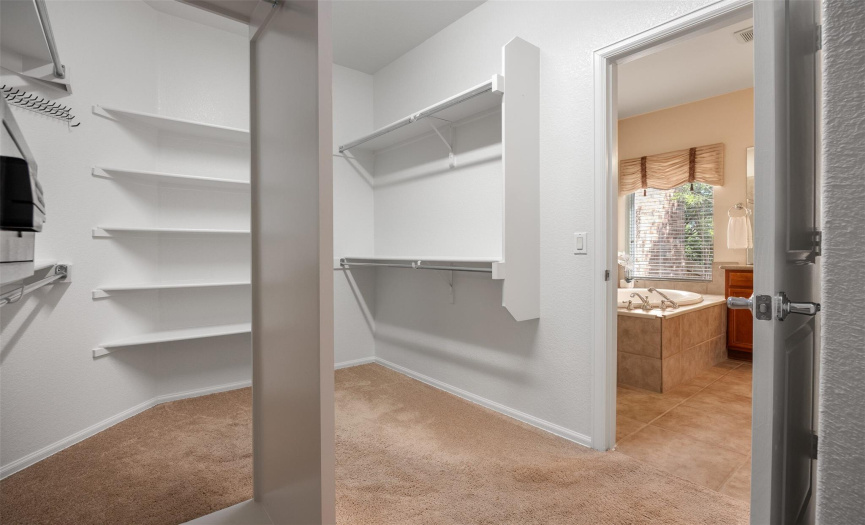 Room for all in this primary walk-in closet
