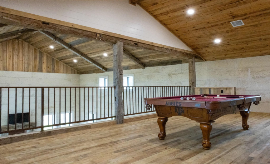 2nd Floor/Loft: Loft Area/game room, Wood Floors and Custom Wood Beams overlooking the Great Room