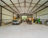 40x60 concrete floor w/ barn & rollup doors. 30&50 Amp electricity as well in this barn.