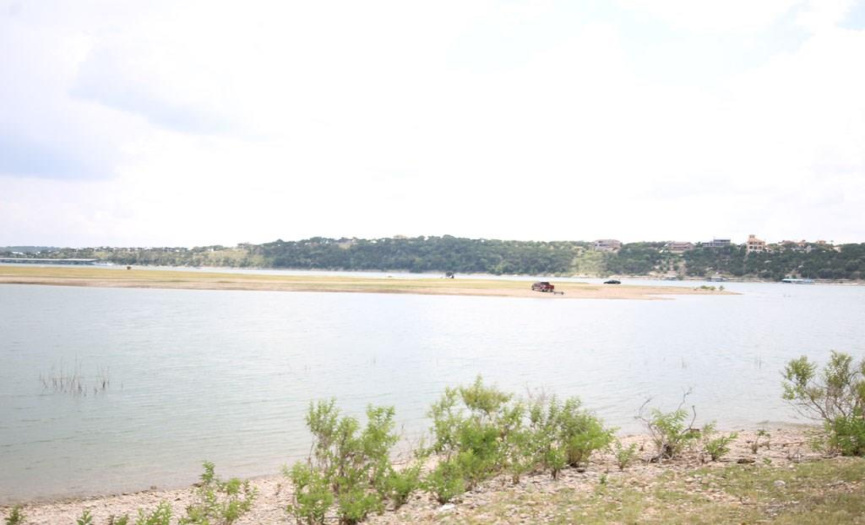Cody Park point at Lake Travis main body. Cove left presently dry during drought