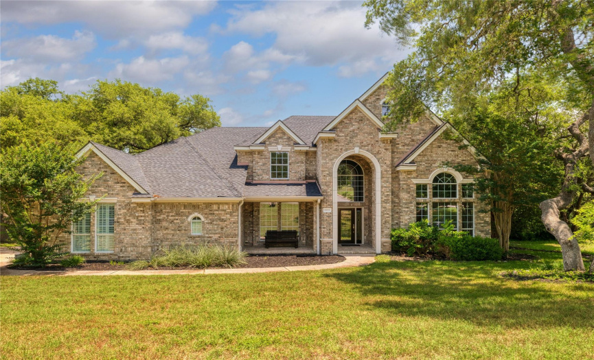 Stately 4-side Country French Brick David Weekley estate home with a new roof and new A/C. Located on 4.29 acres of privacy with room to roam.  The land is so big, it crosses Slaughter Creek by 200 feet plus!