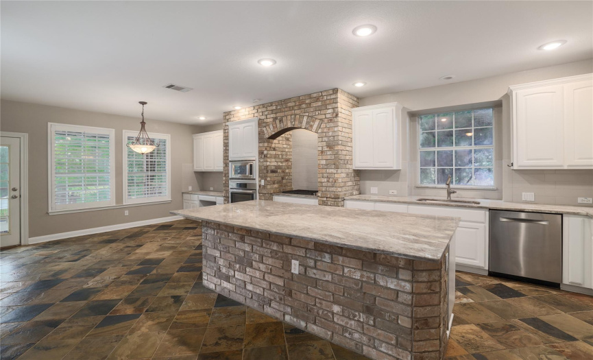 Country Frech Brick kitchen with gorgeous granite, fresh paint, LED lights.