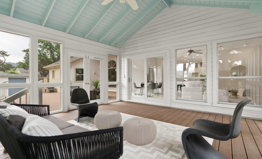The gorgeous screened-in patio allows you to enjoy outdoor living & dining year round, rain or shine, under the soaring vaulted roof with a breeze overhead fan and miles of incredible views. 