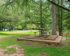 The lakefront community park is a peaceful retreat with mature shade trees, picnic areas, and more. 