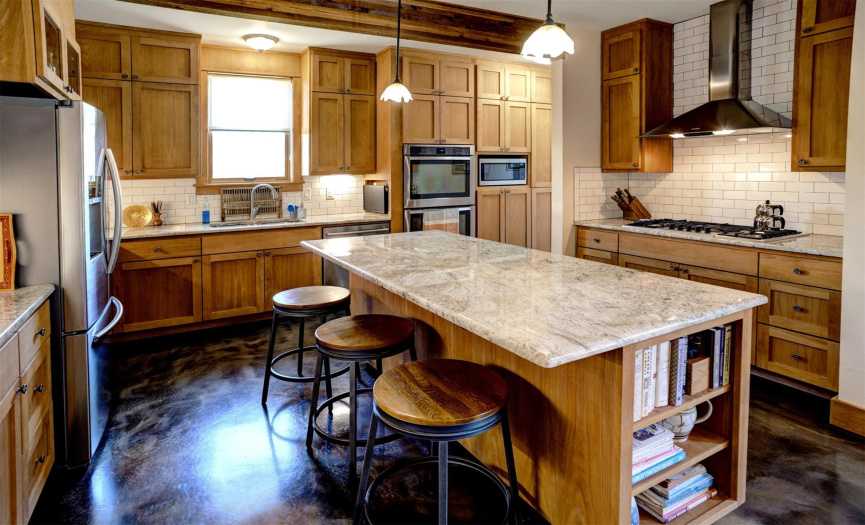 Well appointed island kitchen with convenient work triangle