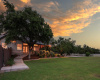 The lush grounds around the main house provide plenty of space to play and enjoy the serene Hill Country views 