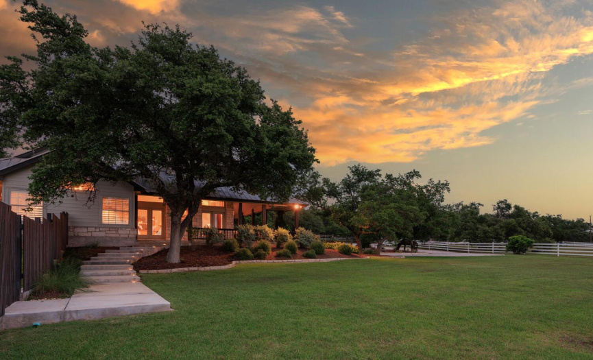 The lush grounds around the main house provide plenty of space to play and enjoy the serene Hill Country views 