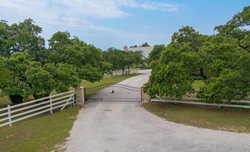 Privately gated, fully fenced and abounding with Southern charm...