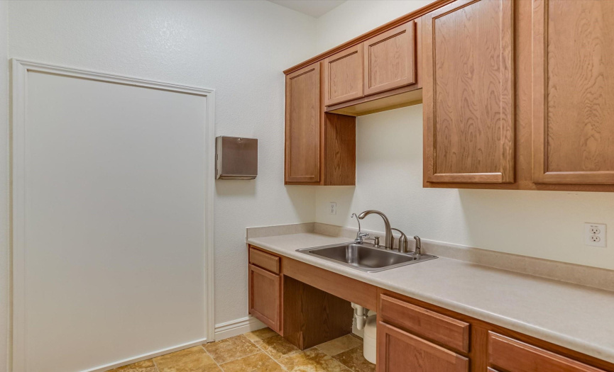 Cozy, yet functional kitchenette/break room offers plenty of space for the java and goodies.