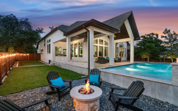 The outdoor entertaining space has been well thought out. Pool, spa, firepit, waterfalls, putting green, outdoor BBQ pit, dual outdoor refrigerator spaces, mounted television with telescoping option. 
