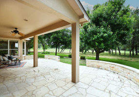 At this popular Trinity plan enjoy time outdoors on your east-facing flagstone patio watching golfers play by on Legacy Hills Golf Course Hole No. 17!