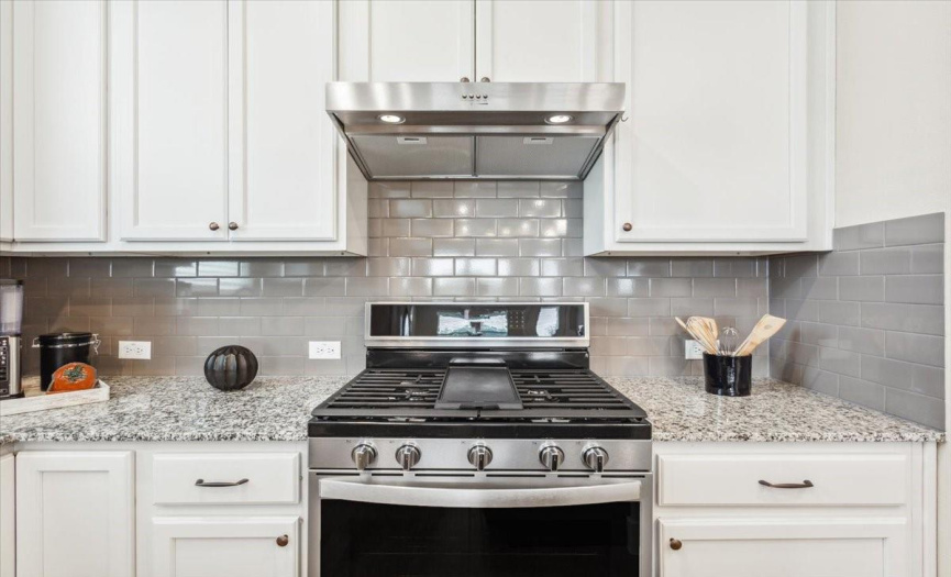 White counter-tops with gas range 