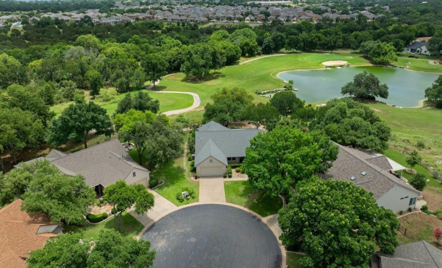 The property is the center house overlooking the 16th Tee Box of the Legacy Golf Course 