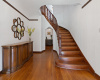 Large foyer with winding stairs 