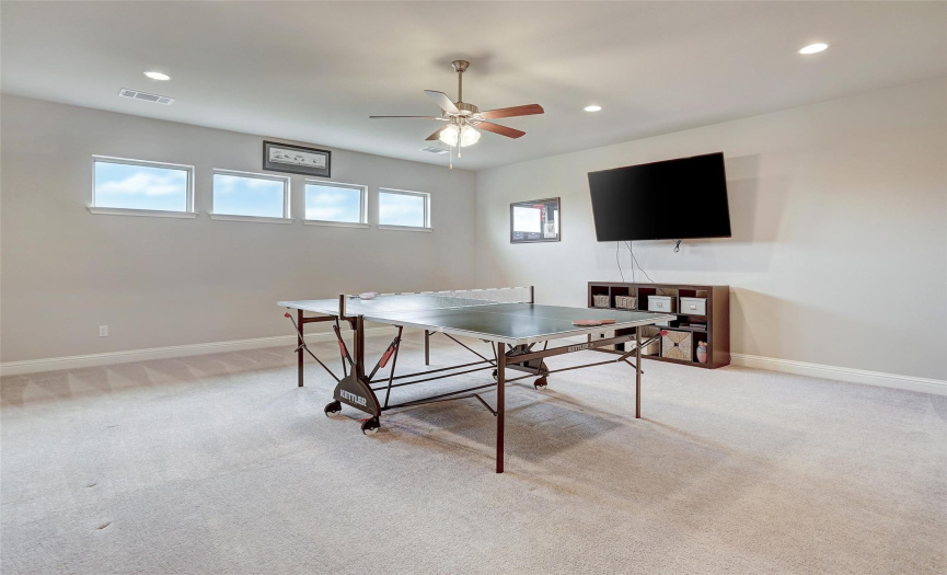 The bonus room is massive and offers so many options for a space for the whole family to spend time together with games, TV, ping pong, pool whatever your family enjoys doing together.