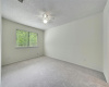 Primary bedroom is large, features recent carpet (2024) and recent ceiling fan.