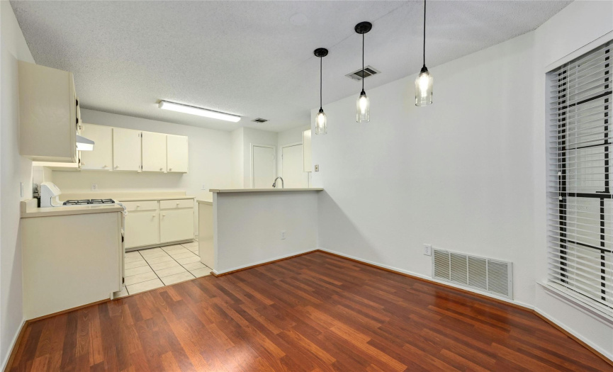 Great layout for entertaining family and friends, updated light fixture in the dining area.