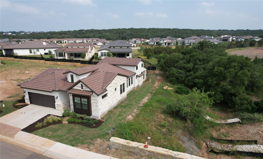 This arial view shows the ravine and mature trees which adds to the privacy of the location.