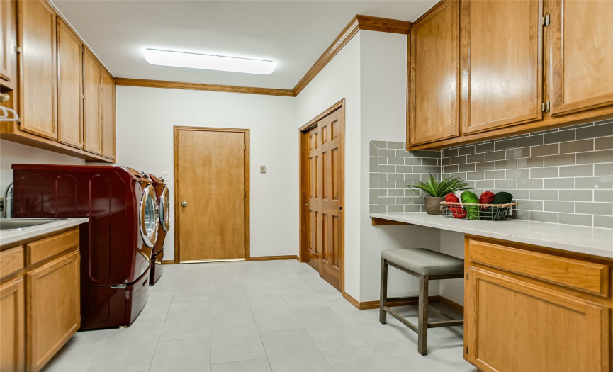 One of the biggest laundry rooms ever, with lots of storage.