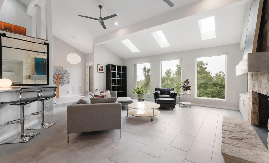 Big views to the east, clever skylights, and high-end window treatments regulate light and temperature.