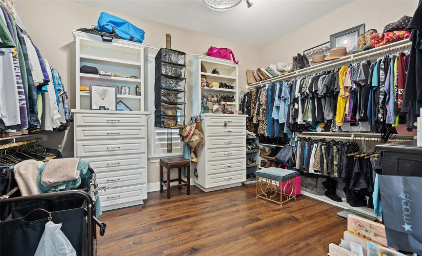 Oversized closet with build in dressers and shelves
