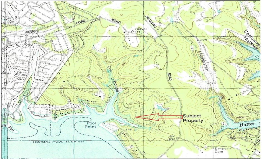 This topo provides an idea of how the property slopes from access road to lake