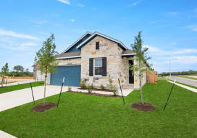 LOOK at the vibrant color and perfectly paired masonry on the functional, corner cul de sac homesite, 104 Ladolia Lane 