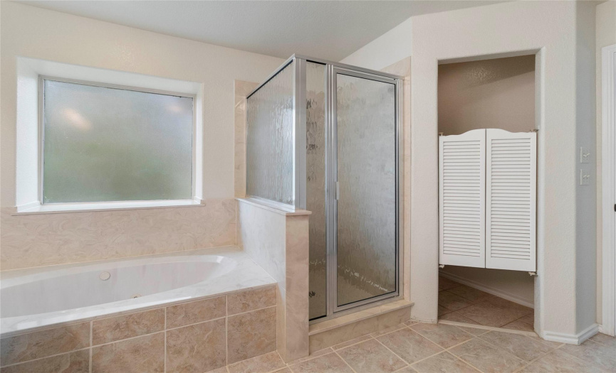 Soaking tub, walk-in shower & private water closet